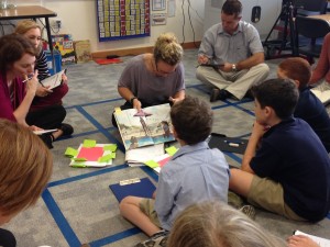 Maggie leading a small group strategy session with second graders.